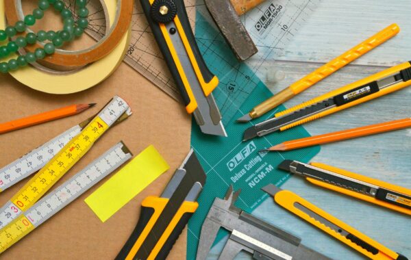 Work tools laid out on a desk